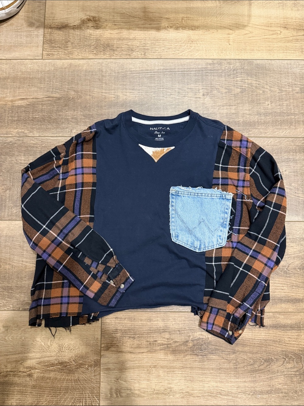 Nautica Navy Knit Top with Brown and Purple Plaid Sleeves and Light Denim Pocket
